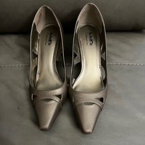 Coach and four Bronze Matte Lazer cutout Kitten heel pumps. Sz 7M